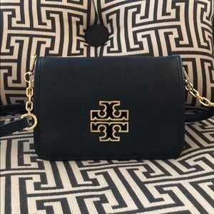 A royal blue Tory Burch crossbody bag